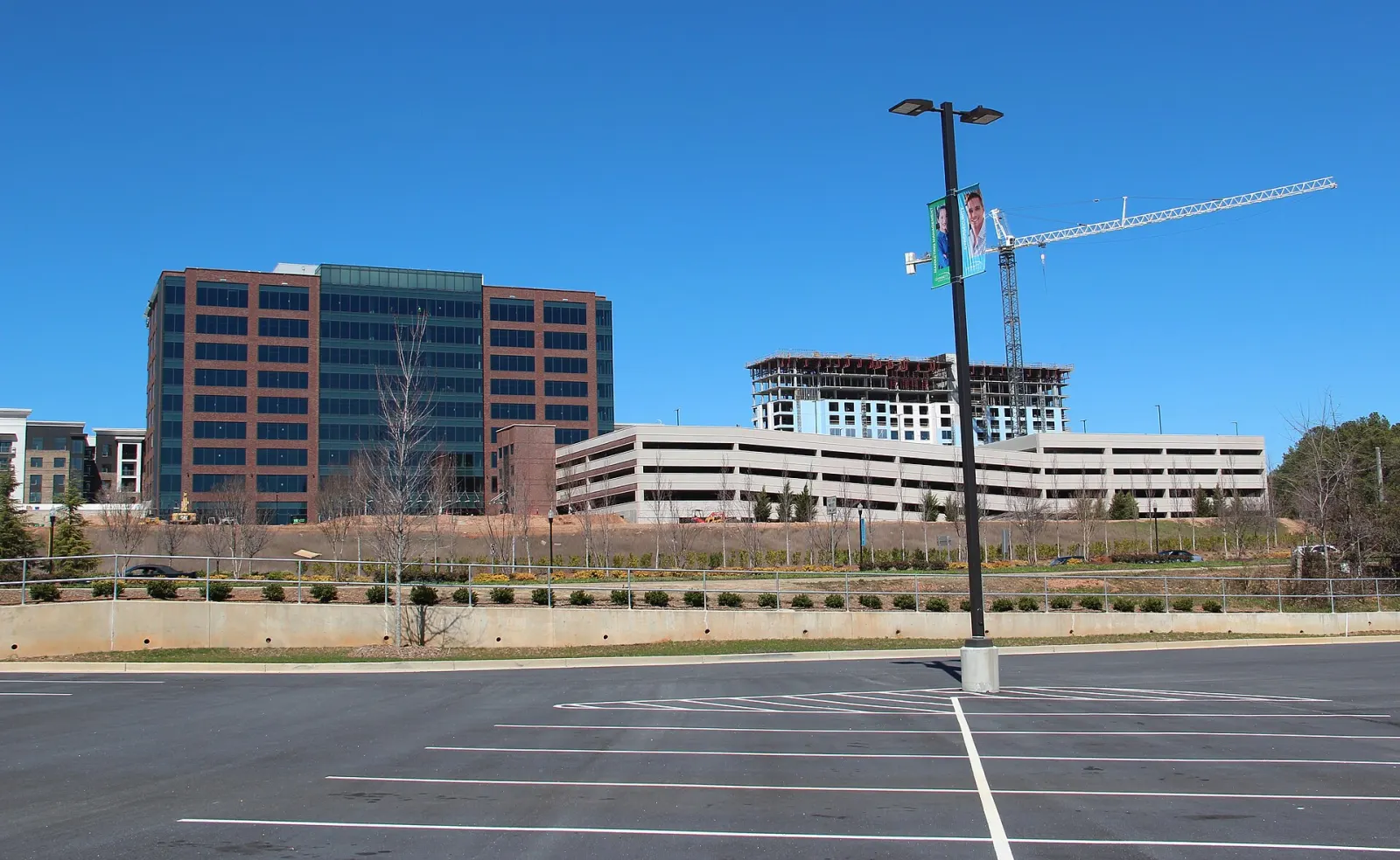 Office, apartment and parking construction near Avalon in Alpharetta