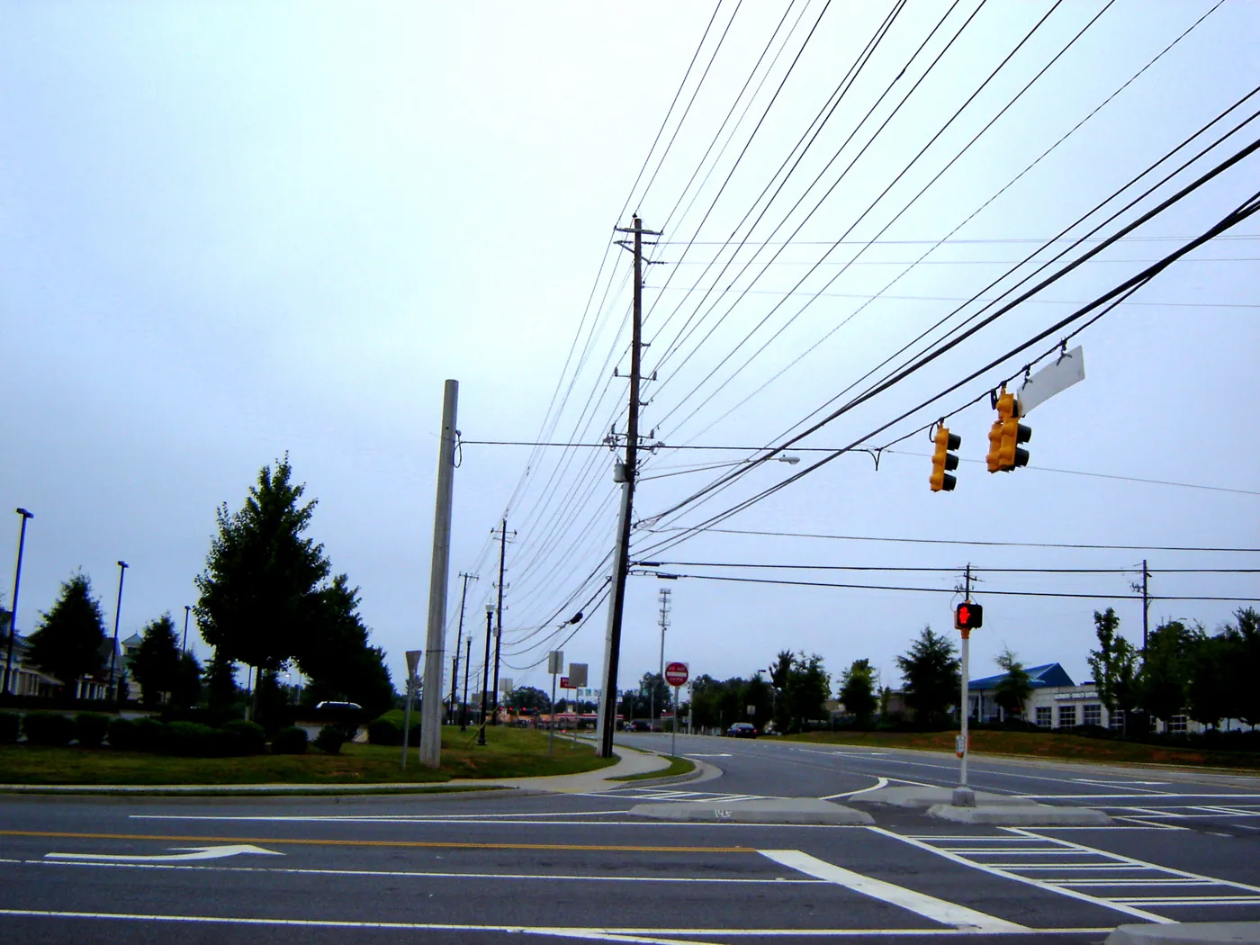 Power lines and traffic signals at an intersection in Alpharetta