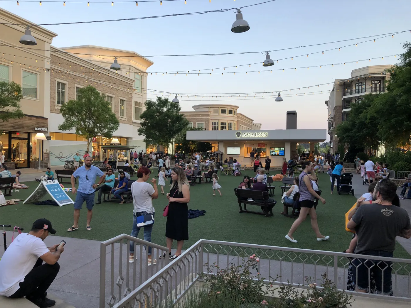 Visitors on the plaza at Avalon in Alpharetta